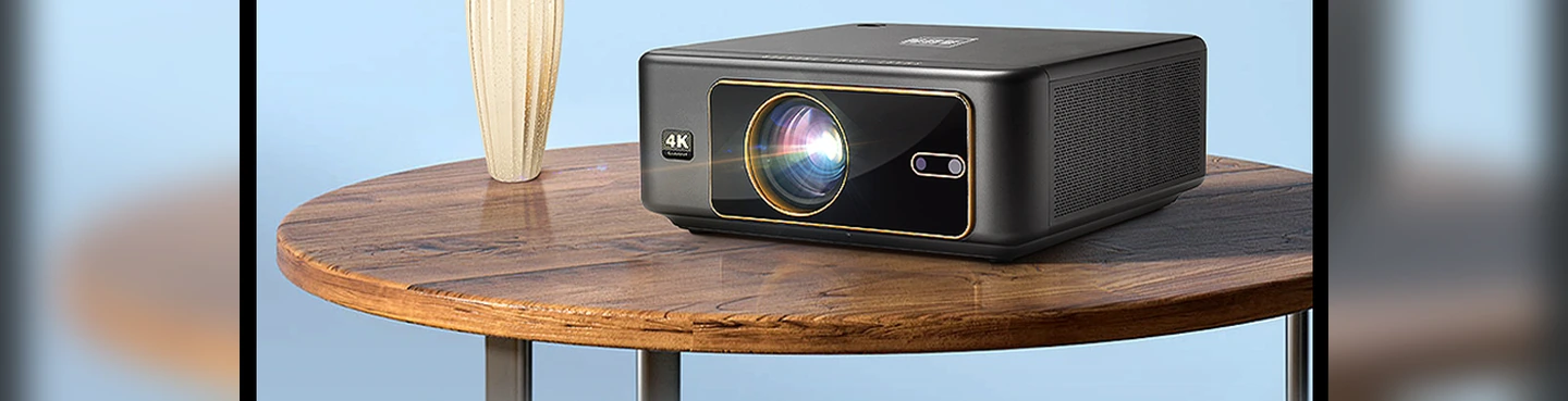 Beamora projector on a wooden table